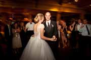 Newlyweds dance during their Beach Club wedding reception.