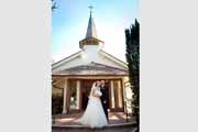Newlyweds outside of Carmel Presbyterian Church after their wedding. 