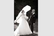 A playful black and white wedding portrait.