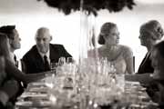 Black and white photo of newlyweds during their Beach Club wedding reception.