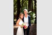 A casual wedding portrait among redwood trees in Big Sur.