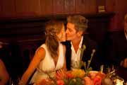 Newlyweds kiss during their Big Sur Bakery wedding reception.