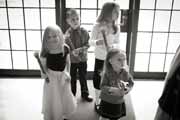 Black and white photo of children before a Brazilian Room wedding.