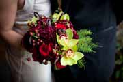 A red and green wedding bouquet.
