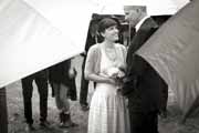 A black and white photo of a rainy day wedding in redwoods at Glen Oaks in Big Sur.