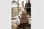 A modern wedding cake make with blue berries.