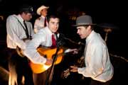 Windy Hill folk band performs for wedding reception.