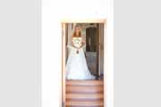 Bride in doorway at Holman Ranch in Carmel Valley.