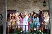 Bridesmaids blow kisses to bride at Holman Ranch in Carmel Valley.