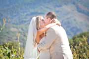 Newlyweds kiss at the conclusion of their Holman Ranch wedding in Carmel Valley.