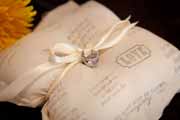 Printed wedding ring pillow detail.