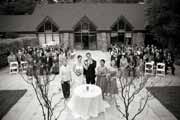 A black and white wedding group portrait at the Brazilian Room in Berkeley, California.