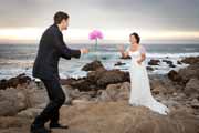 A bride tosses a bouquet at Asilomar Beach in Pacific Grove, California.