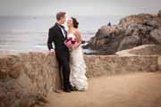 A candid wedding portrait at Lovers Point in Pacific Grove, California.