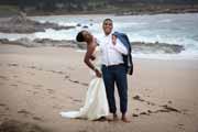 A bride and groom portrait on a beach near Carmel, California.