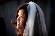 Spontaneous portrait of bride during wedding.
