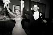 Newlyweds enter their Inn at Spanish Bay wedding reception in Pebble Beach.