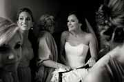 Black and white photo of bride in San Carlos Cathedral vestibule.