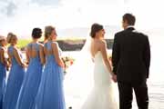 Candid portrait of newlyweds on Pebble Beach Golf Links.