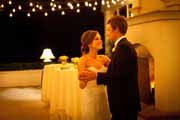 Newlyweds dance on Beach Club's patio.