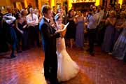 Newlyweds on dance floor in Beach Club dining room.
