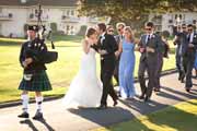 A bagpiper wedding procession in Pebble Beach.