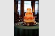 Pebble Beach Resorts wedding cake in Beach Club dining room.