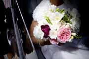 Natalie Bowen Designs wedding bouquet framed in car window.