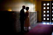 Newlyweds in vestibule of San Francisco's Foreign Cinema Restaurant.