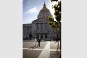 Newlyweds in front of San Francisco City Hall.