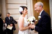 Bride greets groom at San Francisco City Hall.