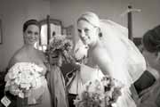 Black and white photo of bride getting ready for wedding.