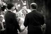 Black and white photo of happy bride during wedding.