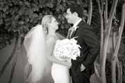 Black and white photo of bride and groom's first look before wedding.