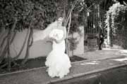 Black and white photo of bride waiting to see groom before wedding.
