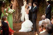 Wedding ceremony among Santa Lucia Preserve redwood trees in Carmel Valley.