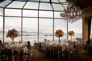 The Beach Club in Pebble Beach dining room decorated for a wedding reception.